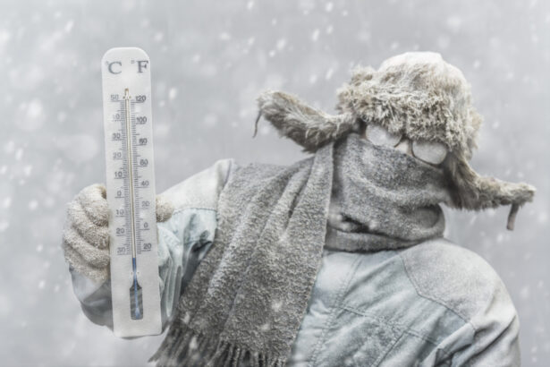 Frozen man holding a thermometer while it is snowing